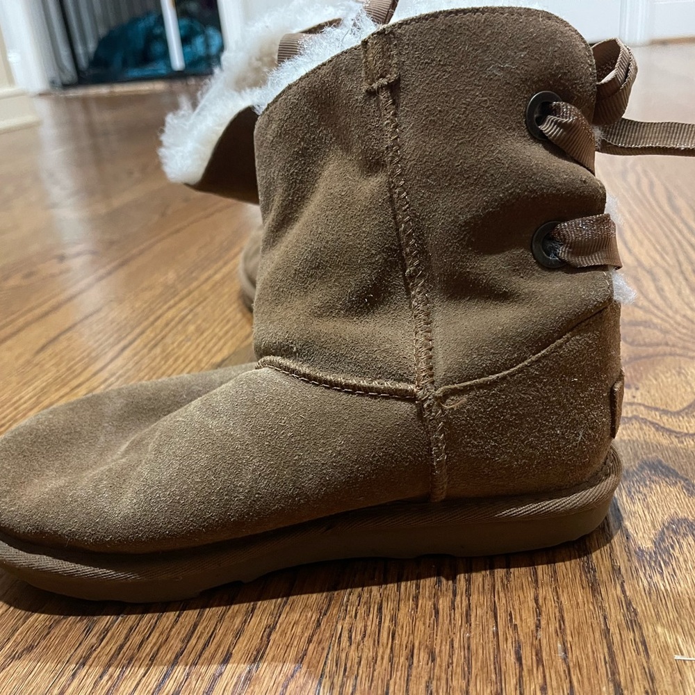 UGG light brown size 3 kids’ boots.
